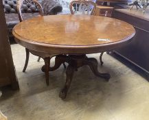 A Victorian oval figured walnut tilt top loo table, length 134cm, width 98cm, height 71cm