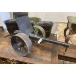 A cast iron model artillery cannon, length 112cm