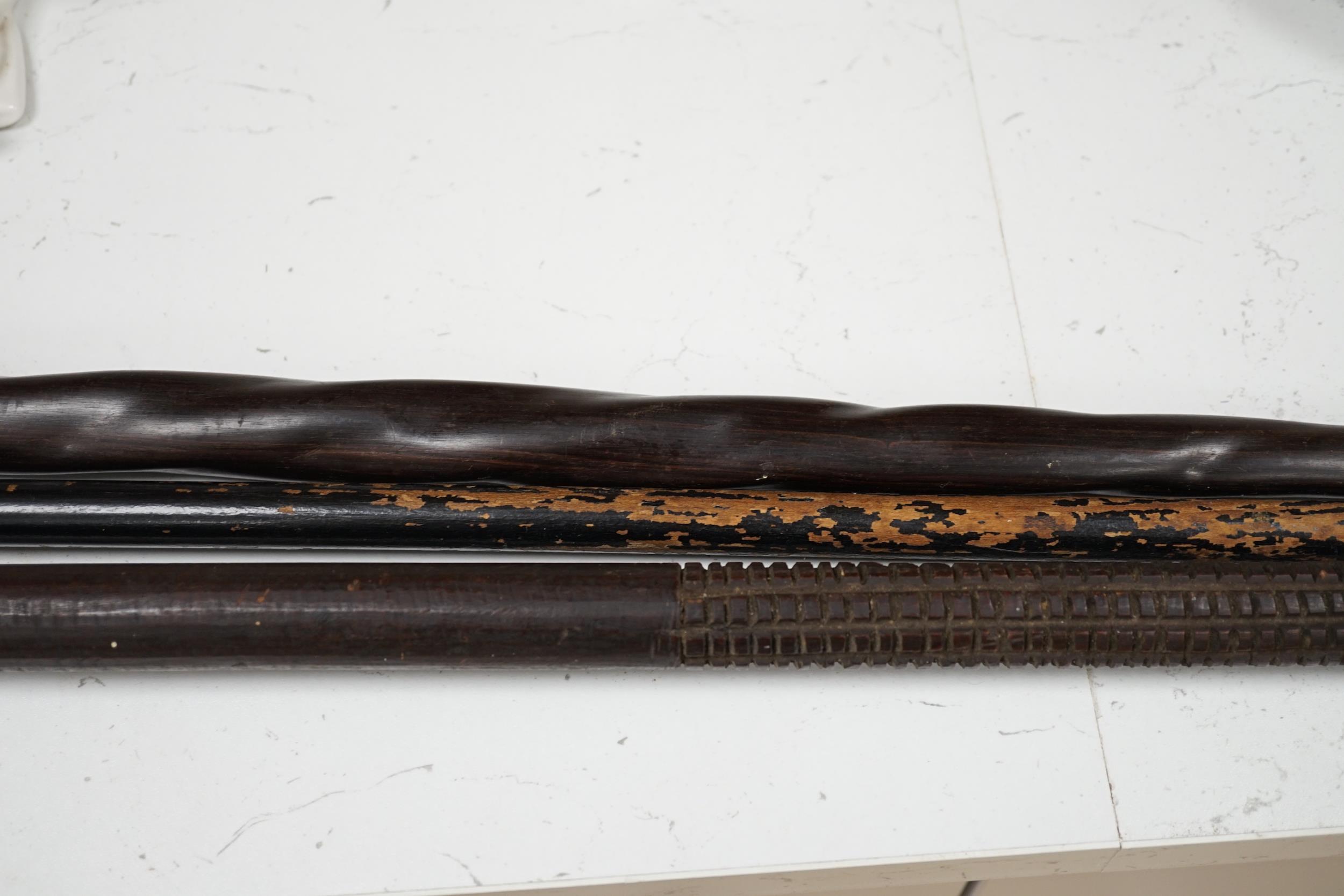 A silver topped walking cane and two African carved wood canes - Image 2 of 6