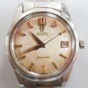 A gentleman's steel Omega Automatic Seamaster wrist watch, with baton numerals, centre seconds and