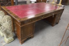 A large 1920's George III mahogany pedestal partner's desk, two drawers Phillip, Bristol, length