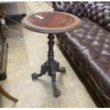 A 19th century French circular marble topped tripod wine table, diameter 50cm, height 77cm