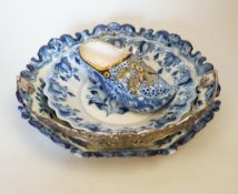 Two delftware dishes, largest 26cm, and a delftware clog,