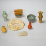 A group of Chinese small ceramics and a hardstone bi disc- 10.5 cm diameter