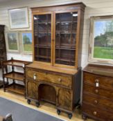 A George IV ebony banded mahogany secretaire kneehole bookcase, width 121cm, depth 57cm, height