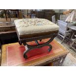 An early 20th century Regency style mahogany X frame dressing stool with tapestry box seat, width