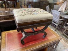 An early 20th century Regency style mahogany X frame dressing stool with tapestry box seat, width