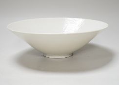 A Chinese white Anhua decorated conical dish, 20cm