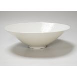 A Chinese white Anhua decorated conical dish, 20cm