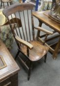 A Victorian elm and beech Windsor comb back armchair, width 52cm, depth 42cm, height 108cm
