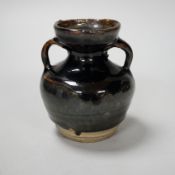 A Chinese Jian type two handled jar, possibly Song dynasty, 8cm high Provenance - the vendor lived