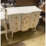 A contemporary painted dressing table, matching chest of drawers and dressing stool, larger width