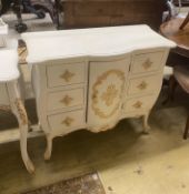 A contemporary painted dressing table, matching chest of drawers and dressing stool, larger width