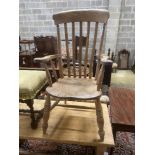 A Victorian elm and beech Windsor lathe back armchair, width 61cm, depth 49cm, height 113cm