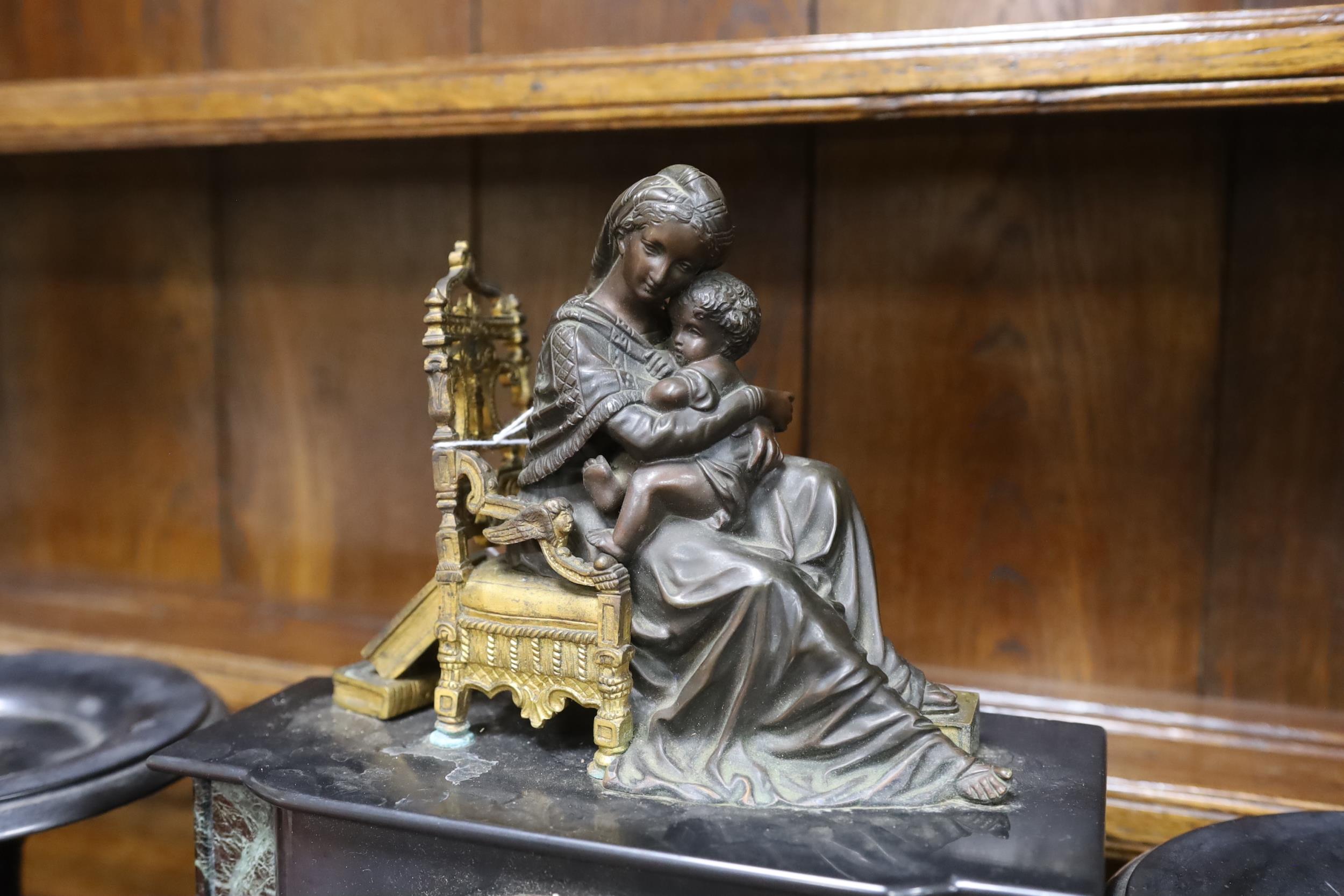 A late 19th century French black slate clock garniture with seated mother and child metal mount, - Image 2 of 2