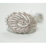 An 18ct white gold and diamond peacock feather design ring, size N