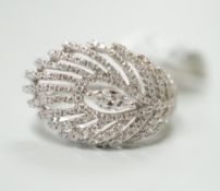 An 18ct white gold and diamond peacock feather design ring, size N