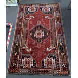 A Hamadan red ground rug, 234 x 148cm