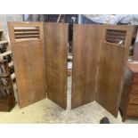 A pair of mid century oak two-fold dressing screens, with Bowman Bros. Camden, Ltd., trade labels,
