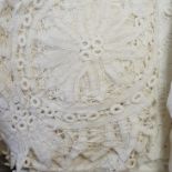 A collection of linen crochet and tape lace edged table cloths