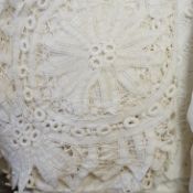 A collection of linen crochet and tape lace edged table cloths