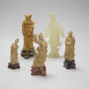 A Chinese bowenite figure and four Chinese carved soapstone figures, the largest 21cm high (5)