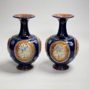 A pair of Royal Doulton vases, 22cm high