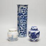An early 20th century Chinese vase together with two small jars with covers, highest 31cm