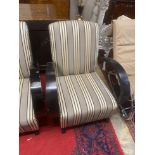 A pair of Deco style ebonised upholstered armchairs, width 78cm, depth 92cm, height 87cm