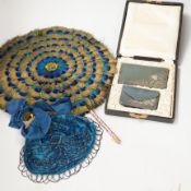 A 19th century peacock feather fan, a cut steel bag and a cased leather and silver mounted purse and