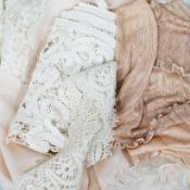 Two Edwardian pink silk and lace inserted camisole tops, a fine 1920’s blouse, a chemise and a