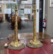 A pair of decorative gilt metal table lamps, 54cm excluding light fitting