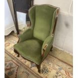 A late Victorian upholstered mahogany armchair, width 66cm, depth 75cm, height 96cm