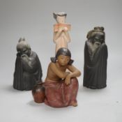 Four Lladro pottery figures