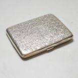 An Edwardian foliate engraved silver purse, London 1902, 10.5cm, gross 109 grams