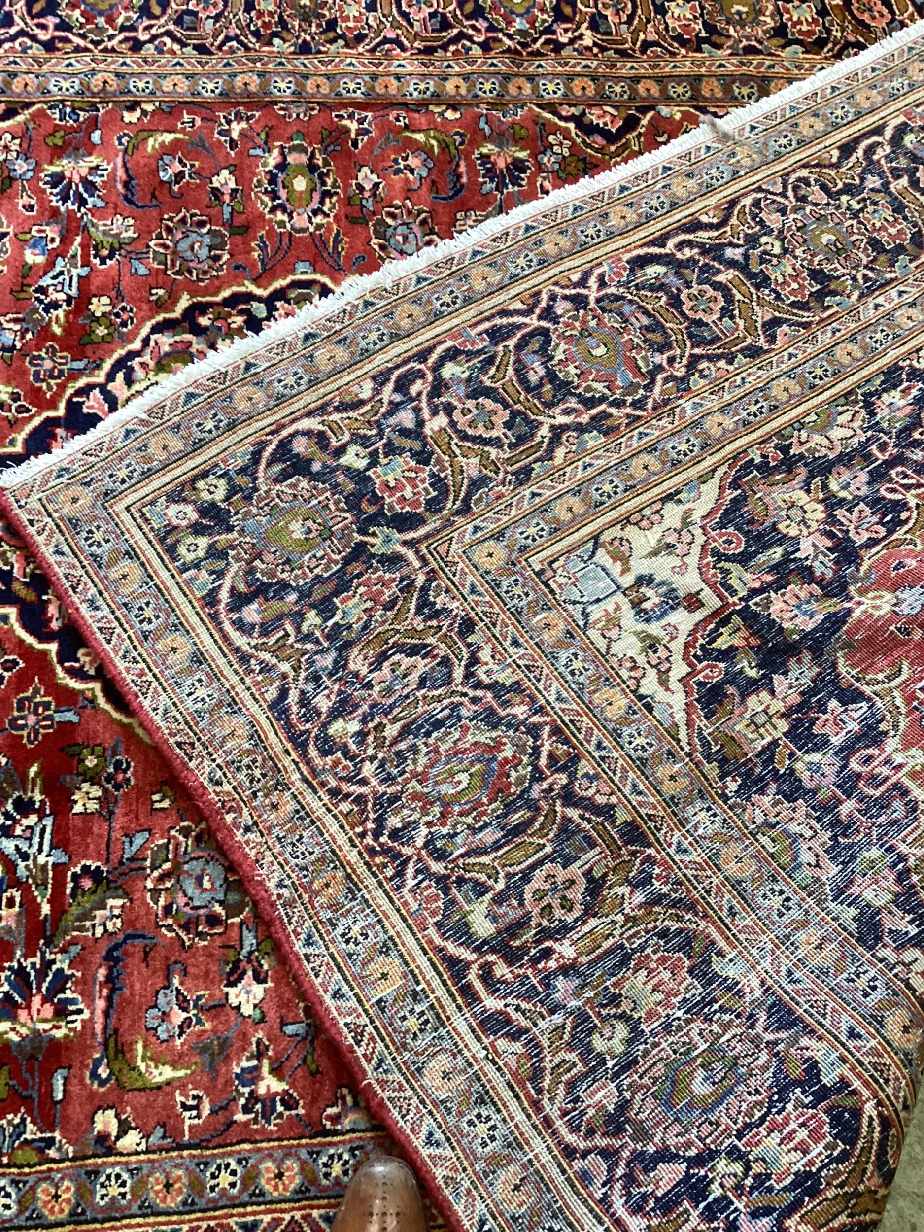 A Kashan brick red ground carpet, approx. 300 x 195cm - Bild 2 aus 2