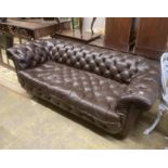 A Victorian buttoned brown leather Chesterfield settee, length 200cm, depth 84cm, height 66cm