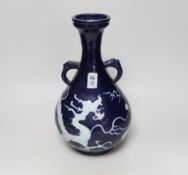 A Chinese blue ground dragon chasing the flaming pearl hu vase, 35cm high