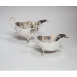 An Edwardian crested silver sauceboat, of lobed form, with scroll feet, makers R & B, Sheffield