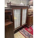 A 19th century Continental mahogany display cabinet, width 116cm, depth 35cm, height 171cm