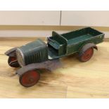 A large 1920s style tinplate and wood truck, length 62.5cm