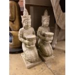 A pair of Thai style composition faux marble kneeling attendant garden ornaments, height 85cm