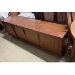 A mid century Danish Mobler teak sideboard (lacking legs), length 200cm, depth 46cm, height 64cm