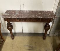 An early 20th century French carved oak marble top console table, adapted, width 107cm, depth