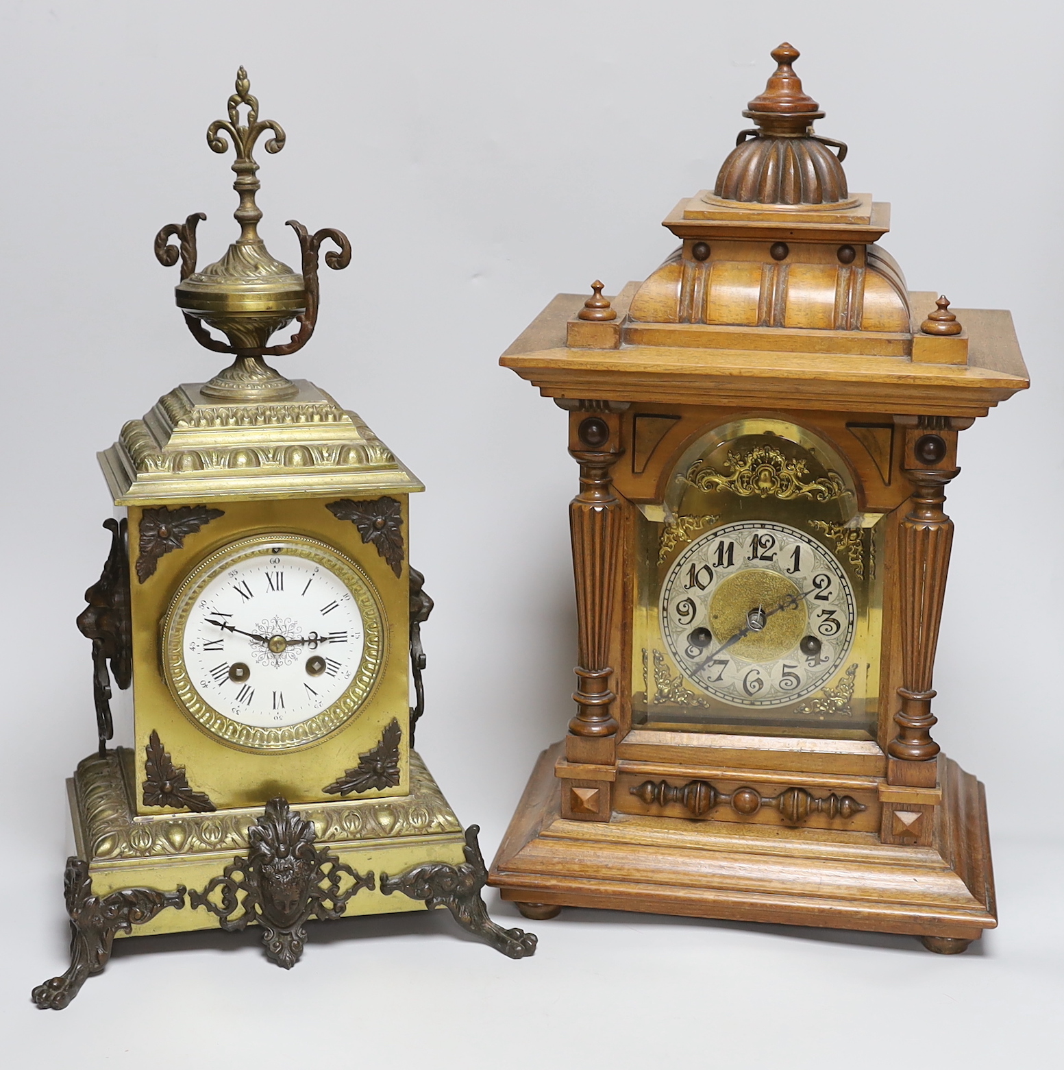 A late 19th century French brass mantle clock and another