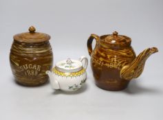 Two 19th century and later teapots including and a Harrods Stella example lidded pottery sugar jar