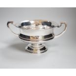 A George V two handled silver bowl, with pedestal foot and beaded rim, makers Elkington & Co.,