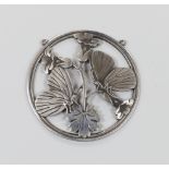 A Georg Jensen sterling pendant modelled with butterflies upon flowers, no.105, 5.25cm