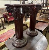 A pair of Victorian style marble top Corinthian column pedestals, height 76cm