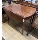 An early 19th century Continental mahogany oval Pembroke table, width 96cm, depth 70cm, height 75cm